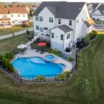 Aerial shot of backyard pool and spa